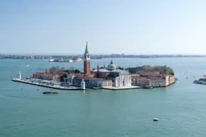 Tra-le-isole-segrete-di-Venezia_San_Giorgio_Maggiore Panoramic view of the Venice lagoon basin and the Doge's Palace taken from the bell tower of San Giorgio Maggiore